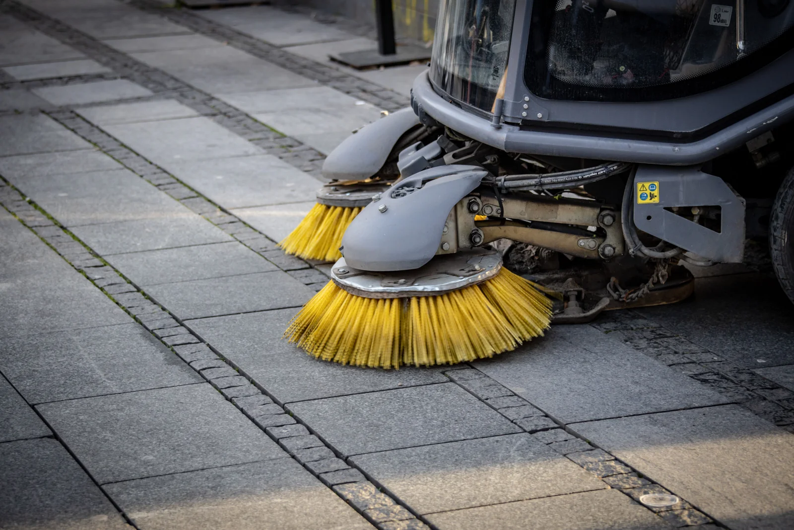 Professional mechanical floor sweeping equipment cleaning commercial paving